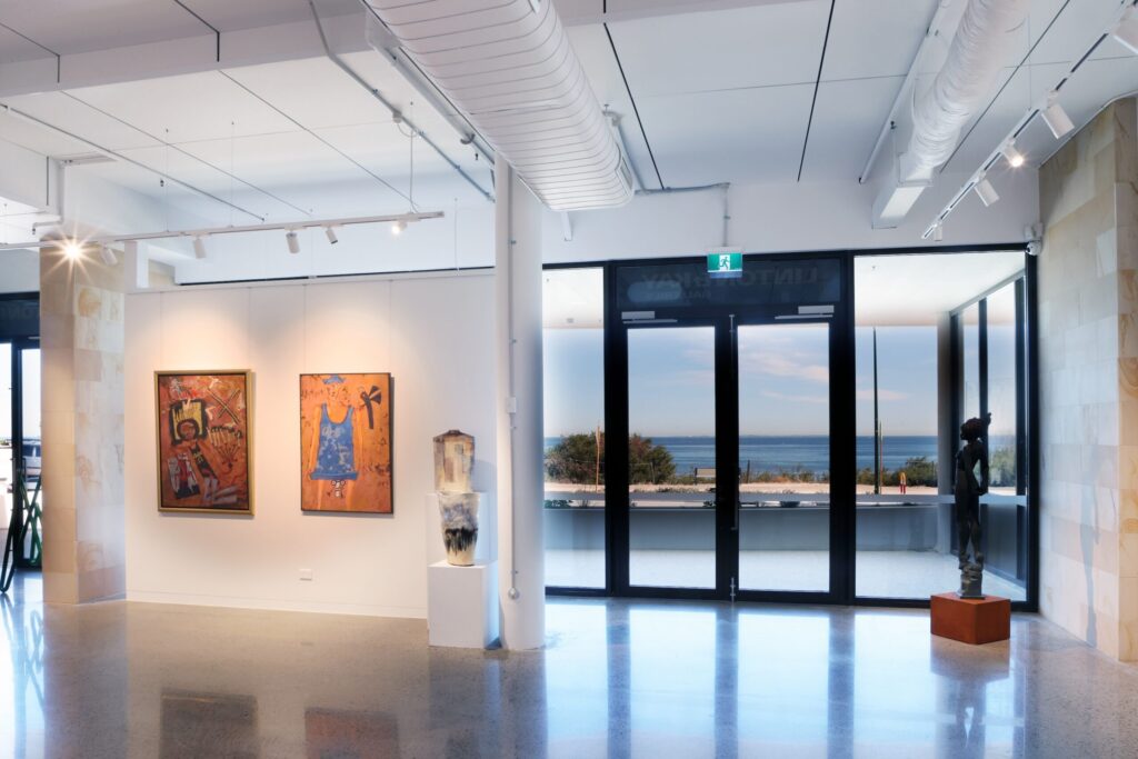 Interior of Linton and Kay Cottesloe gallery featuring ocean views