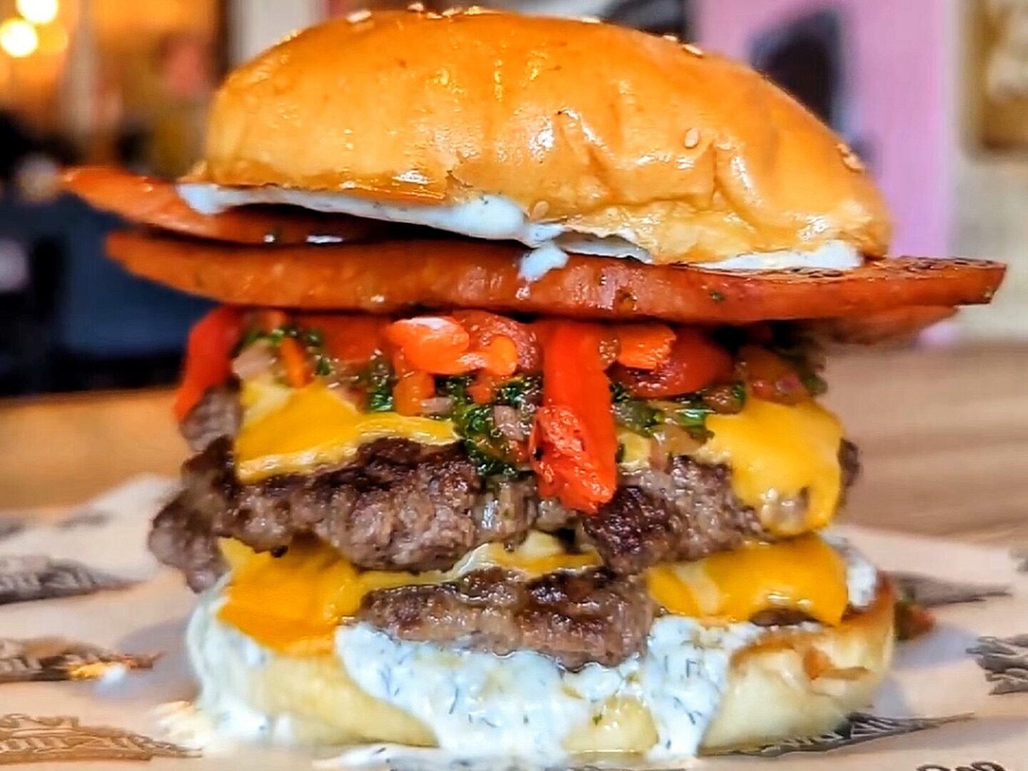 A massive burger served at RoyAl's Chicken & Burgers, perfect for a hungry crowd