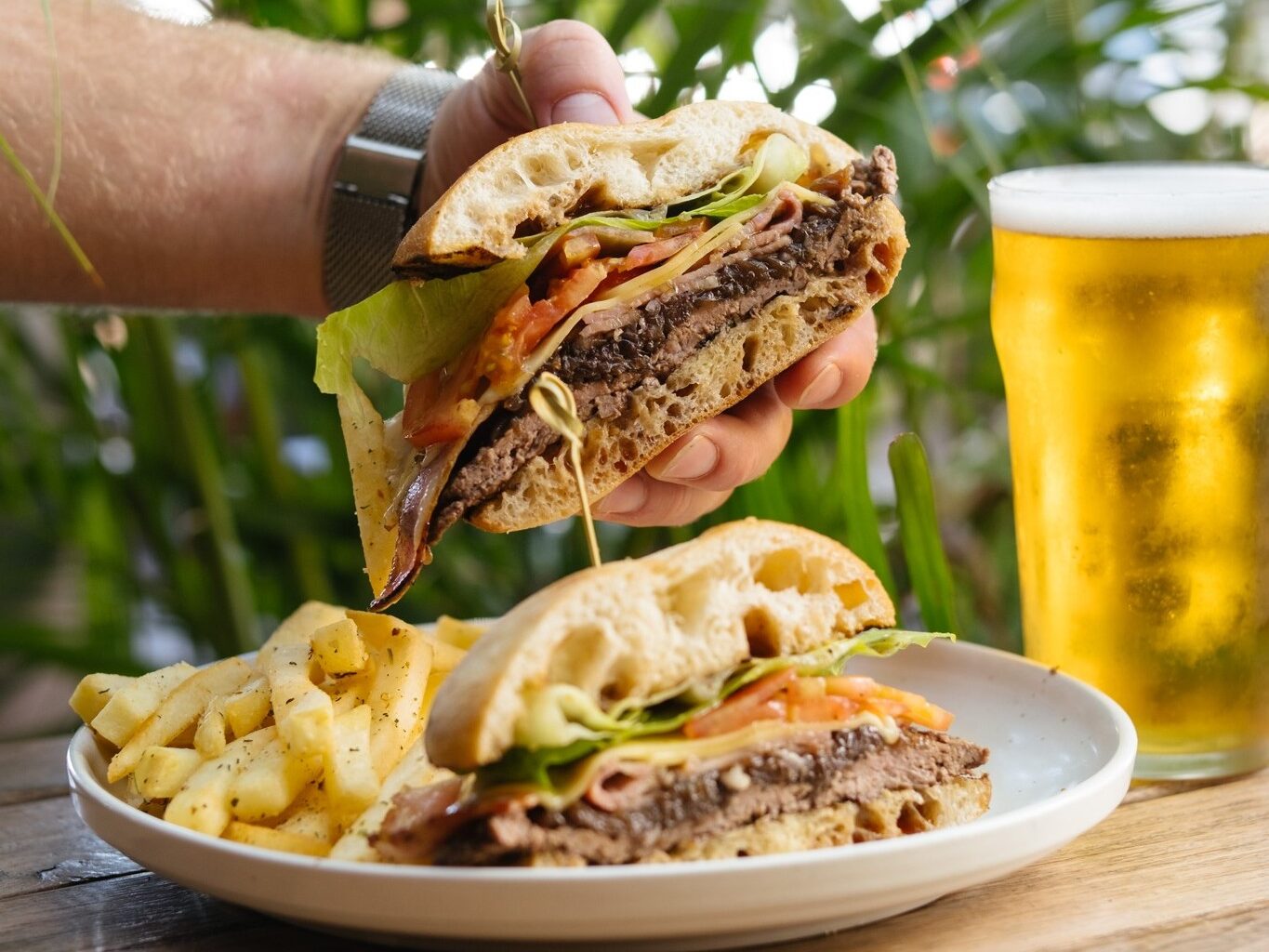 A classic burger and beer combo at Vic Park Hotel, perfect for a game day feast.